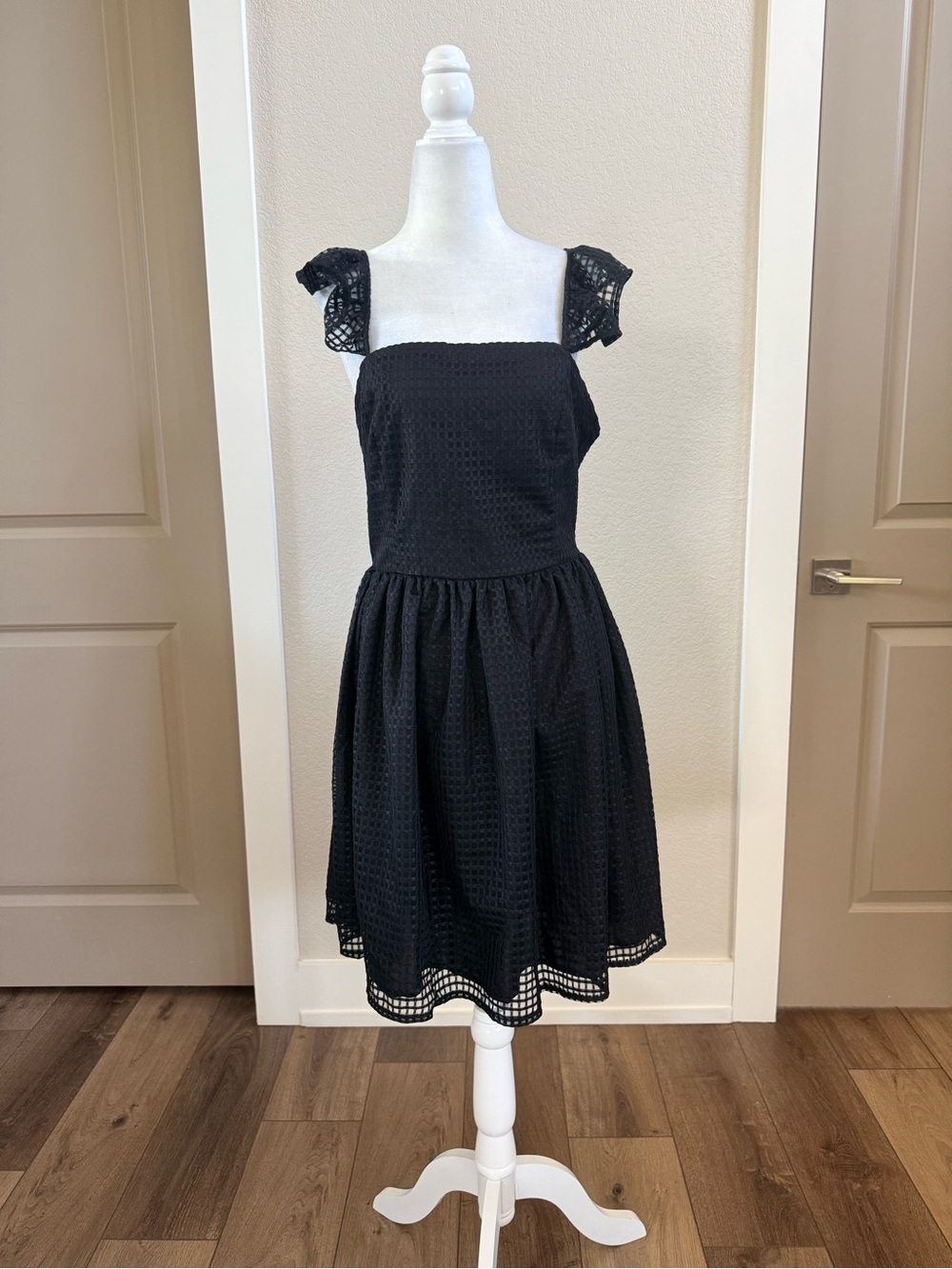 Classic black fit and flare dress by Poundton